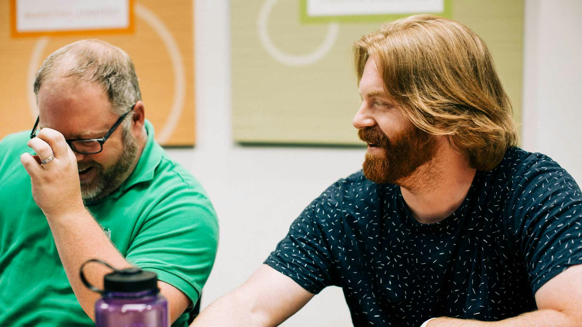 Digital Marketers Working at a Table